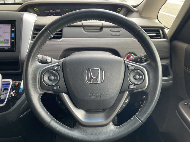 ホンダ フリード ハイブリット G ホンダセンシング 愛知県 2017(平29)年 5.9万km コバルトブルーパール ホンダセンシング/純正ナビ/両側パワースライドドア/レーダークルーズコントロール/シートヒーター/バックカメラ/純正アルミホイール/ＥＴＣ/LEDヘッドライト/レーンキープアシスト/ドライブレコーダー/衝突軽減システム/フルセグ/CD DVD/Bluetooth/ステアリングスイッチ/スマートキー/プッシュスタート