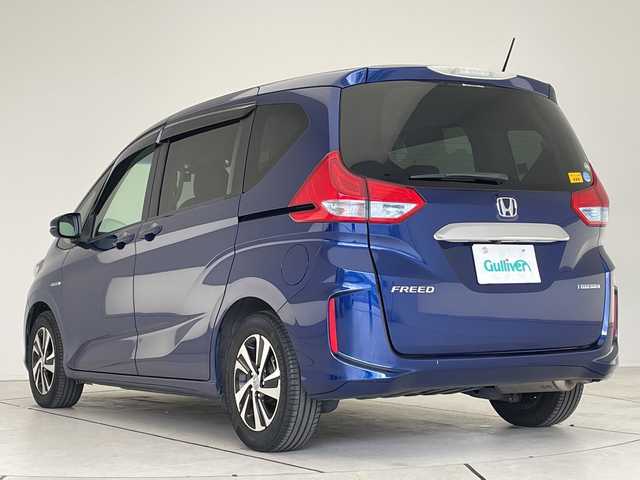 ホンダ フリード ハイブリット G ホンダセンシング 愛知県 2017(平29)年 5.9万km コバルトブルーパール ホンダセンシング/純正ナビ/両側パワースライドドア/レーダークルーズコントロール/シートヒーター/バックカメラ/純正アルミホイール/ＥＴＣ/LEDヘッドライト/レーンキープアシスト/ドライブレコーダー/衝突軽減システム/フルセグ/CD DVD/Bluetooth/ステアリングスイッチ/スマートキー/プッシュスタート