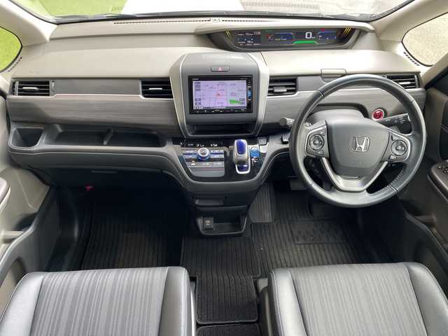 ホンダ フリード ハイブリット G ホンダセンシング 愛知県 2017(平29)年 5.9万km コバルトブルーパール ホンダセンシング/純正ナビ/両側パワースライドドア/レーダークルーズコントロール/シートヒーター/バックカメラ/純正アルミホイール/ＥＴＣ/LEDヘッドライト/レーンキープアシスト/ドライブレコーダー/衝突軽減システム/フルセグ/CD DVD/Bluetooth/ステアリングスイッチ/スマートキー/プッシュスタート