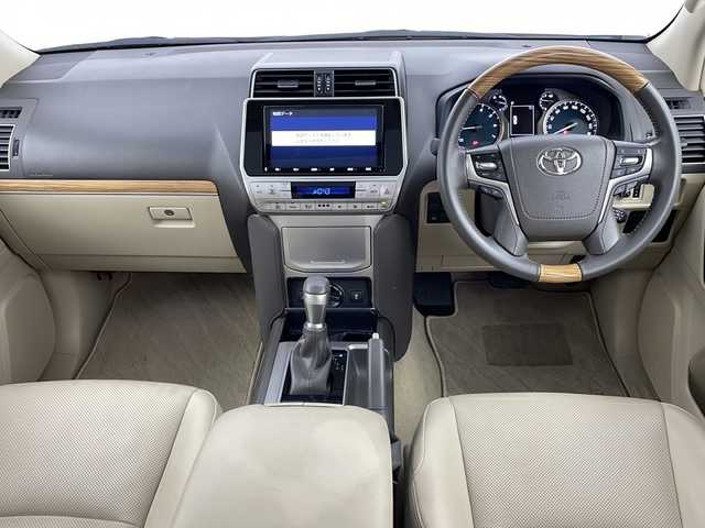 トヨタ ランドクルーザー プラド TX Lパッケージ 鹿児島県 2022(令4)年 1.8万km ホワイトパールクリスタルシャイン Toyota Safety Sense/純正9型ナビ/Bluetooth DVD再生可/フルセグTV/バックカメラ/モデリスタエアロ(F/R)/サンルーフ/ベージュレザーシート /・前席シートヒーター /・前席エアシート/レーダークルーズコントロール/電動サードシート/ビルトインETC/純正19インチアルミホイール/ルーフレール/LEDヘッドライト/フォグライト /オートライトコントロール/スマートキー/エンジンプッシュスタート/純正フロアマット/保証書