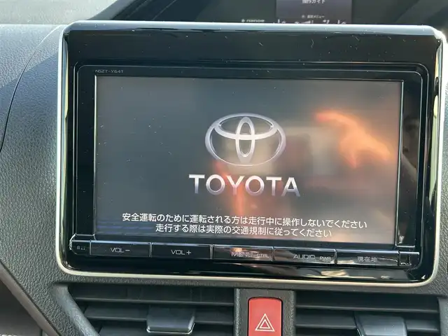 トヨタ エスクァイア ハイブリッド Gi 和歌山県 2014(平26)年 10.5万km ダークバイオレットマイカメタリック 純正ナビ/フルセグTV/バックカメラ/（BT/CD/DVD/MSV）/フリップダウンモニター/車両接近通報/トラクションコントロール/クルーズコントロール/両側パワースライドドア/前方ドラレコ/置くだけ充電/ビルトインETC/レザーシート/プッシュスタート/スマートキー/オートライト/ISOFIX/リアサンシェード/ドアバイザー/nanoe