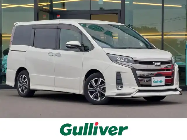 トヨタ ノア Si ダブルバイビー 東京都 2018(平30)年 3万km ラグジュアリーホワイトパールクリスタルシャインガラスフレーク モデリスタフロントスポイラー/純正10インチナビ/両側パワースライドドア/バックカメラ/ビルトインETC/ハーフレザーシート/ドライブレコーダー/トヨタセーフティセンス/プリクラッシュセーフティ/クルーズコントロール/LEDヘッドライト/オートマチックハイビーム/アイドリングストップ