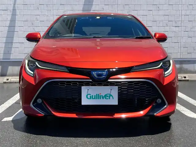 トヨタ カローラ スポーツ ハイブリッドG Z 静岡県 2018(平30)年 8.1万km スカーレットメタリック Toyota Safety Sense/純正9インチナビ(NSZT-Y66T)/　AM FM CD DVD Bluetooth SDREC/バックモニター/LEDオートヘッドランプ/レーダークルーズコントロール/ドライブモードセレクト/社外18インチアルミホイール/スマートキー2本/アイドリングストップ/パーキングアシスト/フルセグTV/ビルトインETC/前方ドライブレコーダー