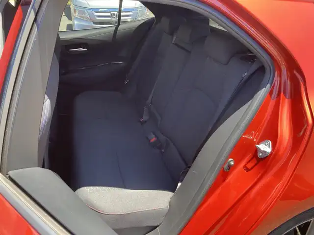 トヨタ カローラ スポーツ ハイブリッドG Z 静岡県 2018(平30)年 8.1万km スカーレットメタリック Toyota Safety Sense/純正9インチナビ(NSZT-Y66T)/　AM FM CD DVD Bluetooth SDREC/バックモニター/LEDオートヘッドランプ/レーダークルーズコントロール/ドライブモードセレクト/社外18インチアルミホイール/スマートキー2本/アイドリングストップ/パーキングアシスト/フルセグTV/ビルトインETC/前方ドライブレコーダー
