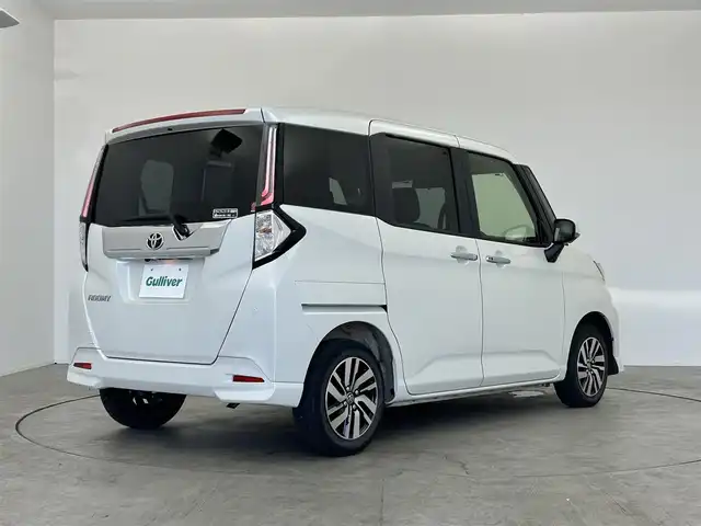 トヨタ ルーミー カスタムG 愛知県 2022(令4)年 2.2万km パールホワイトⅢ 純正9インチディスプレイオーディオ/全方位カメラ/フルセグTV/Bluetooth/Apple CarPlay/Android　Auto/スマートアシスト/衝突被害軽減システム/クルーズコントロール/レーンキープアシスト/コーナーセンサー/横滑り防止装置/オートライト/オートマチックハイビーム/LEDヘッドライト/LEDフォグランプ/両側パワースライドドア/シートヒーター/ETC/純正AW/純正フロアマット/プッシュスタート/スマートキー/スペアキー