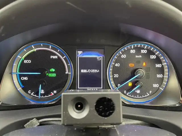 トヨタ ハリアー ハイブリッド プレミアム メタル&レザーP 富山県 2019(令1)年 3.7万km ホワイトパールクリスタルシャイン 純正ナビ（AM/FM/DVD/BT/フルセグ）/バックカメラ/ドライブレコーダー/ETC/レザーシート/D/N席パワーシート/D席メモリシート/シートヒーター/シートベンチレーション/衝突被害軽減システム/レーダークルーズコントロール/レーンキープアシスト/横滑り防止装置/オートホールド付電子パーキング/純正アルミホイール/純正フロアマット/オートLEDライト/フォグライト/ウッドコンビステアリング/ステアリングスイッチ/スマートキー/スペアキー/カードキー