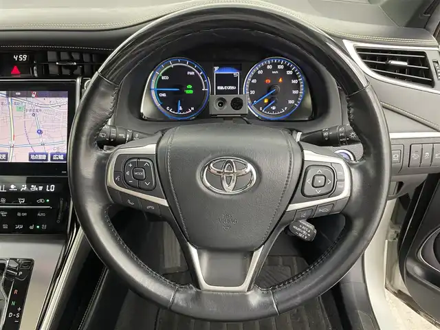 トヨタ ハリアー ハイブリッド プレミアム メタル&レザーP 富山県 2019(令1)年 3.7万km ホワイトパールクリスタルシャイン 純正ナビ（AM/FM/DVD/BT/フルセグ）/バックカメラ/ドライブレコーダー/ETC/レザーシート/D/N席パワーシート/D席メモリシート/シートヒーター/シートベンチレーション/衝突被害軽減システム/レーダークルーズコントロール/レーンキープアシスト/横滑り防止装置/オートホールド付電子パーキング/純正アルミホイール/純正フロアマット/オートLEDライト/フォグライト/ウッドコンビステアリング/ステアリングスイッチ/スマートキー/スペアキー/カードキー