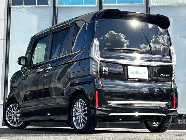 ホンダ Ｎ ＢＯＸ カスタム L ターボ 山形県 2021(令3)年 7.5万km クリスタルブラックパール 純正SDナビ 　Bluetooth/CD/DVD/iPod/両側パワースライドドア /バックカメラ　/追従走行付きクルーズコントロール　/コーナーセンサー　/前席シートヒーター　/ビルトインETC パドルシフト　/純正アルミホイール　/純正フロアマット　