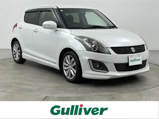 スズキ スイフト RS 大分県 2014(平26)年 7.7万km スノーホワイトパール 社外SDナビ/（フルセグ/CD/DVD/Bluetooth）/ETC/オートライト/HIDヘッドライト/フォグランプ/オートエアコン/ステアリングスイッチ/クルーズコントロール/電動格納ミラー/プッシュスタート・スマートキー/保証書・取扱説明書