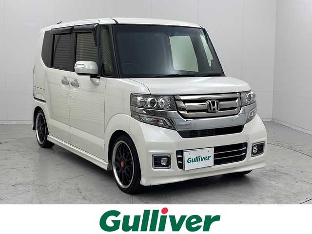 ホンダ Ｎ ＢＯＸ カスタム ターボ SSブラックSパッケージ 茨城県 2017(平29)年 7万km プレミアムホワイトパールⅡ 純正ナビ/・Bluetooth接続/・フルセグテレビ/・バックカメラ/ETC/ドライブレコーダー/社外ホイール/両側パワースライドドア/オートライト/エンジンスタートボタン/クルーズコントロール/スマートキー/ドアバイザー/パドルシフト/フロントフォグ/社外マフラー