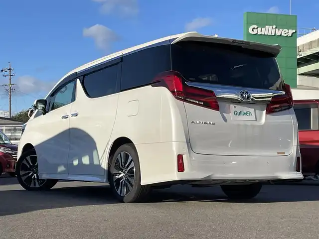 トヨタ アルファード S Cパッケージ 愛知県 2021(令3)年 3.6万km ホワイトパールクリスタルシャイン 純正ディスプレイオーディオ/(CD/DVD/Bluetooth/フルセグTV)/バックカメラ/純正フリップダウンモニター/両側パワースライドドア/パワーバックドア/黒レザーシート/前席シートヒーター&エアコンシート/前席&2ndパワーシート/オットマン/ドライブレコーダー/ETC2.0/LEDヘッドライト/フォグランプ/レーダークルーズコントロール/PCS/nanoe
