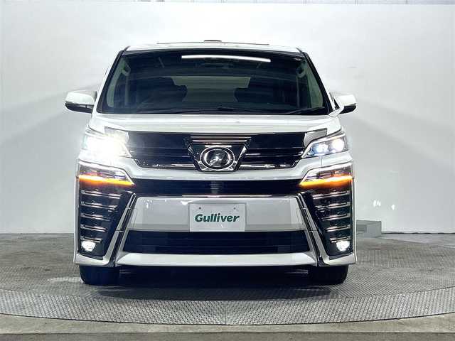トヨタ ヴェルファイア Z Gエディション 大阪府 2018(平30)年 1.3万km ホワイトパールクリスタルシャイン ツインムーンルーフ　衝突軽減　レーンアシスト　　純正１０インチナビ　シートヒーター　エアシート　パワーシート　メモリシート　パワーバックドア　両側電動ドア　ビルトインＥＴＣ　ドラレコ