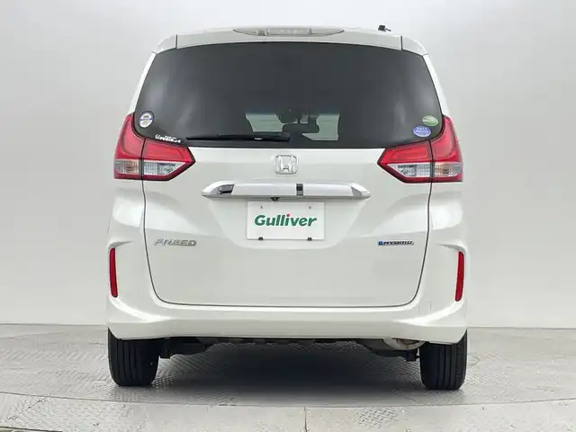 ホンダ フリード ハイブリット G ホンダセンシング 新潟県 2018(平30)年 2.6万km ホワイトオーキッドパール ホンダセンシング/　・衝突被害軽減ブレーキ/　・レーンキープアシスト/　・アダプティブクルーズコントロール/純正ナビ/　（フルセグTV/BT/CD/DVD/AM/FM）/バックカメラ/両側パワースライドドア/LEDオートライト/ステアリングスイッチ/スマートキー/ビルトインETC