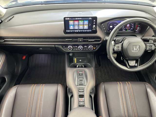 ホンダ ＺＲ－Ｖ ハイブリッド e:HEV Z 道央・札幌 2022(令4)年 2.2万km ミッドナイトブルービームM ・４WD/ハイブリッド/・Honda SENSING/・ブラインドスポットインフォメーション/・アダプティブドライビングビーム/・マルチビューカメラシステム/・Honda CONNECTディスプレー/・ナビ.Bluetooth.フルセグTV/・ETC2.0車載器＋ワイヤレス充電器/・本革シート＋運転席8ウェイ助手席パワーシート/・(ドライビングポジションシステム付)/・運転席＆助手席シートヒーター/・リア左右席シートヒーター/・BOSEプレミアムサウンドシステム(12スピーカー)/・ハンズフリーアクセスパワーテールゲート/・前後ドライブレコーダー/・フロントワイパーデアイサー/・パドルシフト/・LEDライト/・18インチアルミホイール