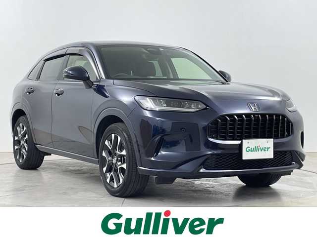 ホンダ ＺＲ－Ｖ ハイブリッド e:HEV Z 道央・札幌 2022(令4)年 2.2万km ミッドナイトブルービームM ・４WD/ハイブリッド/・Honda SENSING/・ブラインドスポットインフォメーション/・アダプティブドライビングビーム/・マルチビューカメラシステム/・Honda CONNECTディスプレー/・ナビ.Bluetooth.フルセグTV/・ETC2.0車載器＋ワイヤレス充電器/・本革シート＋運転席8ウェイ助手席パワーシート/・(ドライビングポジションシステム付)/・運転席＆助手席シートヒーター/・リア左右席シートヒーター/・BOSEプレミアムサウンドシステム(12スピーカー)/・ハンズフリーアクセスパワーテールゲート/・前後ドライブレコーダー/・フロントワイパーデアイサー/・パドルシフト/・LEDライト/・18インチアルミホイール