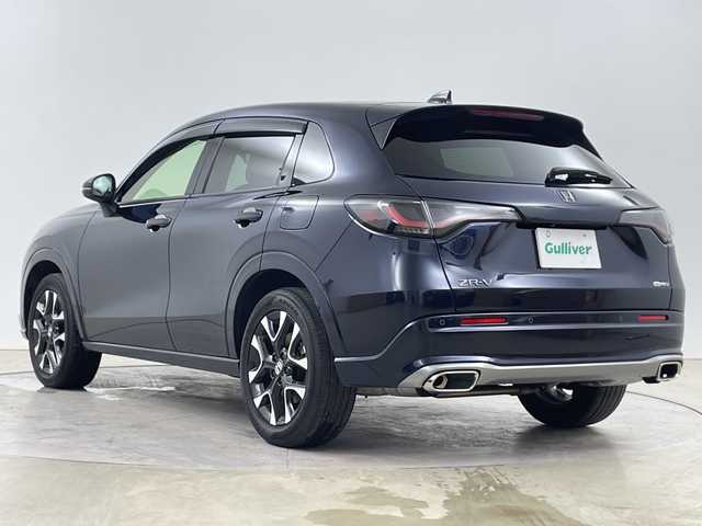 ホンダ ＺＲ－Ｖ ハイブリッド e:HEV Z 道央・札幌 2022(令4)年 2.2万km ミッドナイトブルービームM ・４WD/ハイブリッド/・Honda SENSING/・ブラインドスポットインフォメーション/・アダプティブドライビングビーム/・マルチビューカメラシステム/・Honda CONNECTディスプレー/・ナビ.Bluetooth.フルセグTV/・ETC2.0車載器＋ワイヤレス充電器/・本革シート＋運転席8ウェイ助手席パワーシート/・(ドライビングポジションシステム付)/・運転席＆助手席シートヒーター/・リア左右席シートヒーター/・BOSEプレミアムサウンドシステム(12スピーカー)/・ハンズフリーアクセスパワーテールゲート/・前後ドライブレコーダー/・フロントワイパーデアイサー/・パドルシフト/・LEDライト/・18インチアルミホイール