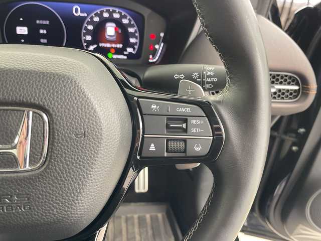 ホンダ ＺＲ－Ｖ ハイブリッド e:HEV Z 道央・札幌 2022(令4)年 2.2万km ミッドナイトブルービームM ・４WD/ハイブリッド/・Honda SENSING/・ブラインドスポットインフォメーション/・アダプティブドライビングビーム/・マルチビューカメラシステム/・Honda CONNECTディスプレー/・ナビ.Bluetooth.フルセグTV/・ETC2.0車載器＋ワイヤレス充電器/・本革シート＋運転席8ウェイ助手席パワーシート/・(ドライビングポジションシステム付)/・運転席＆助手席シートヒーター/・リア左右席シートヒーター/・BOSEプレミアムサウンドシステム(12スピーカー)/・ハンズフリーアクセスパワーテールゲート/・前後ドライブレコーダー/・フロントワイパーデアイサー/・パドルシフト/・LEDライト/・18インチアルミホイール