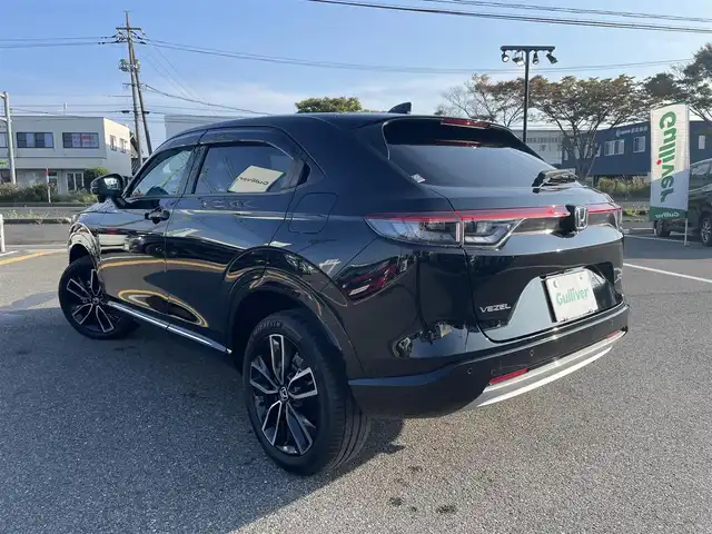 ホンダ ヴェゼル ハイブリッド e:HEV Z 鳥取県 2023(令5)年 1.6万km クリスタルブラックパール 4WD・ハイブリット/純正9型ナビ/フルセグ/BT バックカメラ/ビルトインETC/ホンダセンシング/レーダークルーズコントロール/レーンキープアシスト/パワーバックドア/電動パーキングブレーキ/LEDヘットライト/前席シートヒーター/ハーフレザーシート/オプションフロントグリル/純正１８インチアルミホイール/ワイアレス充電/フロアマット