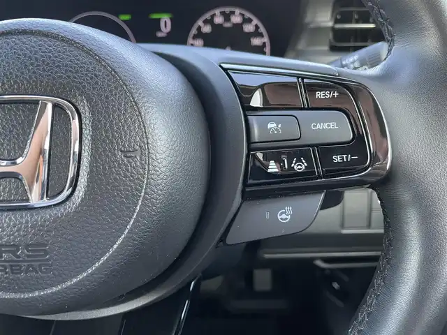 ホンダ ヴェゼル ハイブリッド e:HEV Z 鳥取県 2023(令5)年 1.6万km クリスタルブラックパール 4WD・ハイブリット/純正9型ナビ/フルセグ/BT バックカメラ/ビルトインETC/ホンダセンシング/レーダークルーズコントロール/レーンキープアシスト/パワーバックドア/電動パーキングブレーキ/LEDヘットライト/前席シートヒーター/ハーフレザーシート/オプションフロントグリル/純正１８インチアルミホイール/ワイアレス充電/フロアマット