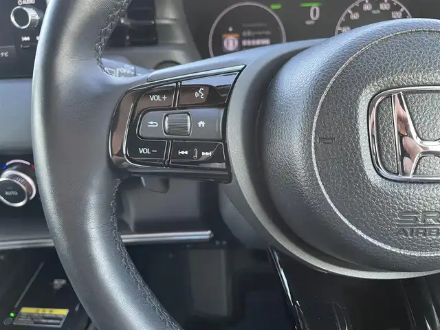 ホンダ ヴェゼル ハイブリッド e:HEV Z 鳥取県 2023(令5)年 1.6万km クリスタルブラックパール 4WD・ハイブリット/純正9型ナビ/フルセグ/BT バックカメラ/ビルトインETC/ホンダセンシング/レーダークルーズコントロール/レーンキープアシスト/パワーバックドア/電動パーキングブレーキ/LEDヘットライト/前席シートヒーター/ハーフレザーシート/オプションフロントグリル/純正１８インチアルミホイール/ワイアレス充電/フロアマット