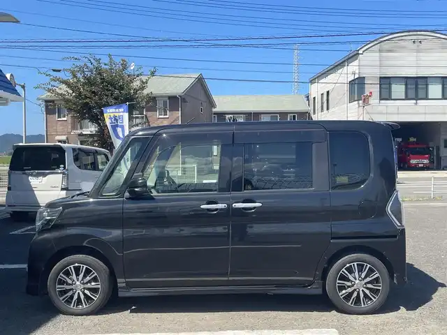 ダイハツ タント カスタム X トップED SA Ⅲ 徳島県 2018(平30)年 8万km ブラックマイカメタリック (株)IDOMが運営する【じしゃロン徳島店】の自社ローン専用車両になりますこちらは現金またはオートローンご利用時の価格です。/社外ナビゲーション　/全方位モニター　/ＥＴＣ　/ＬＥＤヘッドライト　/純正アルミホイール　/両側パワースライドドア　/両席シートヒーター　/オートハイビーム　/プッシュスタート　/スマートキー　/スペアキー