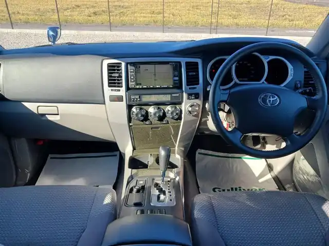 トヨタ ハイラックス サーフ SSR－G 岩手県 2004(平16)年 6.1万km グレイッシュブルーメタリック 4WD/純正MOPナビTV/バックカメラ/ETC/フロントフォグランプ/オートライト/オートエアコン/革巻きステアリング/荷室ダブルデッキ/トレイ/AC100Vコンセント/純正17インチアルミホイール/リモコンキー/イモビライザー/禁煙車