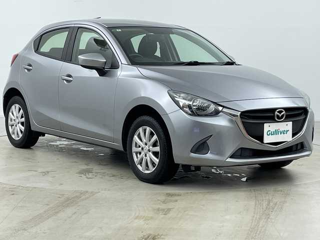 マツダ デミオ 13C 道央・札幌 2016(平28)年 3.8万km アルミニウムメタリック ・４WD/・純正オーディオ（CD＆AM&FM＆AUX＆USB）/・i-Activsense/・アイドリングストップ/・キセノンヘッドライト/・スマートキー/・プッシュスタート/・夏タイヤ積込/・社外１５インチAW