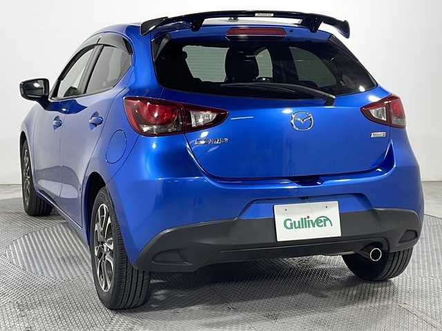 マツダ デミオ XD ツーリング 広島県 2015(平27)年 5.7万km ダイナミックブルーマイカ 純正ナビ　/バックカメラ　/フルセグＴＶ　/リアエアロ　/クルーズコントロール　/衝突軽減ブレーキ　/ＬＥＤヘッドランプ　/オートライト　/フォグランプ　/Ｂｌｕｅｔｏｏｔｈ　/スマートキー　/純正フロアマット　/ＥＴＣ/純正１６インチアルミホイール(185/60/R16)/エアバック（運転席/助手席/サイド/カーテン）