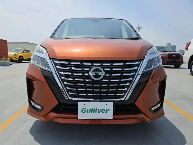 日産 セレナ ハイウェイスター V 愛媛県 2020(令2)年 7.3万km オレンジ 純正10型ナビ(BT/DVD/Blu-ray)/フルセグTV/ハンズフリーパワースライドドア(両側)/インテリジェントアラウンドビューモニター/ビルトインETC/ドライブレコーダー/純正11型後席専用モニター/インテリジェントクルーズコントロール/ソナー機能/プロパイロット/インテリジェントパーキングアシスト/全方位運転支援システム/・インテリジェントエマージェンシーブレーキ/・標識検知機能/・踏み間違い衝突防止アシスト/・車線逸脱防止支援システム/・車線逸脱警報/・車両検知警報(前後)/・ふらつき警報/アダプティブLEDヘッドランプ/本革巻きステアリング/2列目/3列目パーソナルテーブル/純正16インチアルミホイール/インテリジェントキー/プッシュエンジンスターター/禁煙車