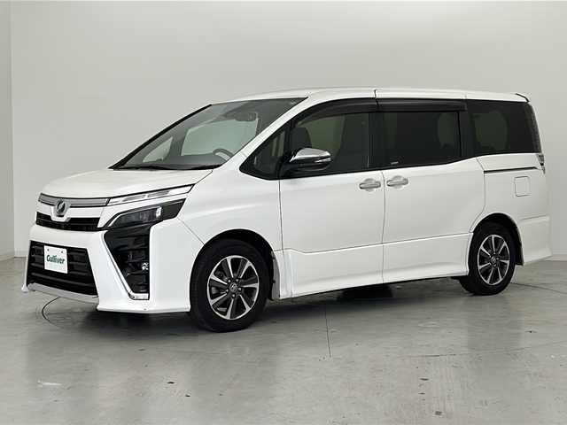 トヨタ ヴォクシー ZS 煌Ⅱ 宮城県 2020(令2)年 3.3万km ホワイトパールクリスタルシャイン Toyota Safety Sense /・プリクラッシュセーフティ/・レーンディパーチャーアラート/・オートマチックハイビーム/クルーズコントロール/純正7インチSDナビ/・BT.CD.DVD/SD/バックカメラ/フルセグTV/両側パワースライドドア/ビルトインETC2.0/ドライブレコーダー（FR）/LEDヘッドライト/LEDフォグライト/ステアリングスイッチ/純正フロアマット/純正16インチAW/シートバックテーブル/ロールサンシェード/ドアバイザー
