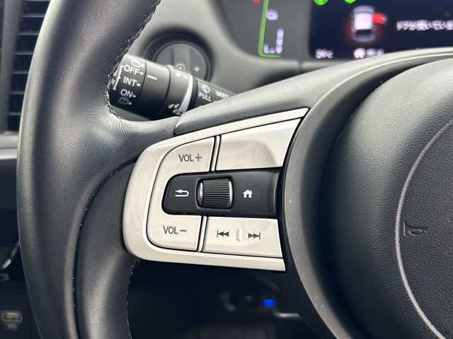 ホンダ フィット e:HEVホーム 宮城県 2021(令3)年 4.4万km プレミアムクリスタルレッドM 純正8インチナビ：VXM-215VFEI/フルセグTV/Bluetooth/CD/DVD/AM/FM/バックカメラ/アダプティブクルーズコントロール/衝突被害軽減ブレーキ/車線逸脱抑制/後方誤発進抑制機能/オートマチックハイビーム/パーキングセンサー/ＬＥＤヘッッドライト/前後ドライブレコーダー/スペアキー×1/電子制御パーキングブレーキ/オートブレーキホールド/充電用USBジャック/15インチAW/ETC/冬タイヤ積み込み/プッシュスタート
