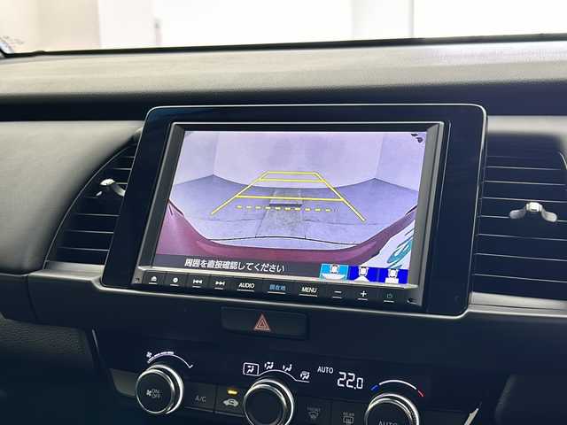 ホンダ フィット e:HEVホーム 宮城県 2021(令3)年 4.4万km プレミアムクリスタルレッドM 純正8インチナビ：VXM-215VFEI/フルセグTV/Bluetooth/CD/DVD/AM/FM/バックカメラ/アダプティブクルーズコントロール/衝突被害軽減ブレーキ/車線逸脱抑制/後方誤発進抑制機能/オートマチックハイビーム/パーキングセンサー/ＬＥＤヘッッドライト/前後ドライブレコーダー/スペアキー×1/電子制御パーキングブレーキ/オートブレーキホールド/充電用USBジャック/15インチAW/ETC/冬タイヤ積み込み/プッシュスタート
