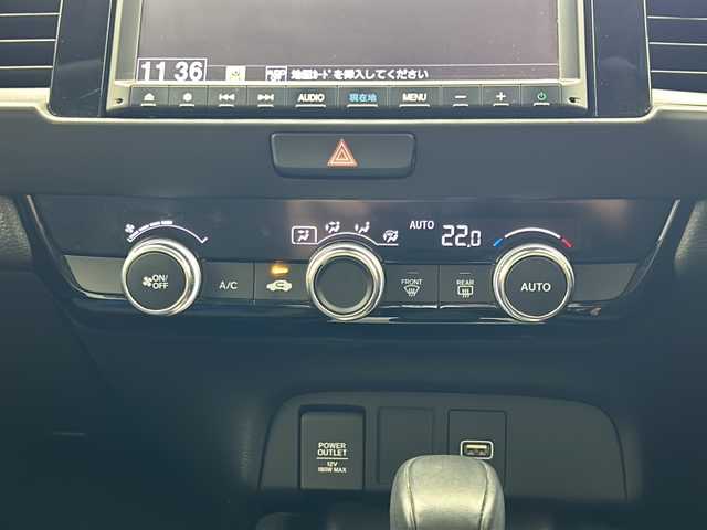 ホンダ フィット e:HEVホーム 宮城県 2021(令3)年 4.4万km プレミアムクリスタルレッドM 純正8インチナビ：VXM-215VFEI/フルセグTV/Bluetooth/CD/DVD/AM/FM/バックカメラ/アダプティブクルーズコントロール/衝突被害軽減ブレーキ/車線逸脱抑制/後方誤発進抑制機能/オートマチックハイビーム/パーキングセンサー/ＬＥＤヘッッドライト/前後ドライブレコーダー/スペアキー×1/電子制御パーキングブレーキ/オートブレーキホールド/充電用USBジャック/15インチAW/ETC/冬タイヤ積み込み/プッシュスタート