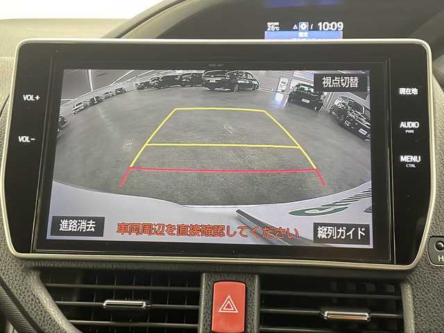 トヨタ ヴォクシー ZS 煌 長崎県 2018(平30)年 9万km ホワイトパールクリスタルシャイン モデリスタフルエアロ　/純正１２．１型後席モニター/純正１０型ナビ/・フルセグＴＶ/・DVD/・Bluetooth/・バックカメラ/セーフティセンス/・先行車発信告知/・レーンディパーチャーアラート/・オートハイビーム/両側電動スライドドア/ビルトインETC/クルーズコントロール/LEDヘッドライト/オートリトラミラー/黒革ハンドル/ステアリングリモコン/リアサンシェード/シートバックテーブル/純正バイザー