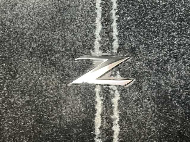 日産 フェアレディ Ｚ 静岡県 2009(平21)年 7.4万km ダイヤモンドブラック 純正メモリナビ/・CD/・DVD/・AM/・FM/主要装備/・アイドリングストップ/・パドルシフト/・ビルトインＥＴＣ/・オートライト/・ステアリングリモコン/・純正フロアマット/・純正アルミホイール/・カーテンエアバック/・スマートキー/・プッシュスタート