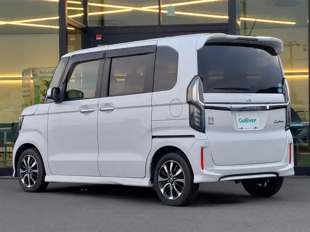 ホンダ Ｎ ＢＯＸ カスタム G L ホンダセンシング 東京都 2020(令2)年 2.1万km プラチナホワイトパール ホンダセンシング/・衝突軽減ブレーキ/・誤発進抑制機能/・路外逸脱抑制機能/・アダプティブクルーズコントロール/プッシュスタート/純正ナビ/(FM/AM/Bluetooth/CD/ワンセグTV）/バックカメラ/片側パワースライドドア/ベンチシート/後席ロールサンシェード/LEDヘッドライト/オートライト/ドアバイザ―/14インチ純正アルミホイール/スマートキー