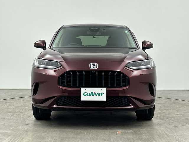 ホンダ ＺＲ－Ｖ ハイブリッド e:HEV Z 三重県 2023(令5)年 1.4万km ワイン /禁煙車//純正9型ナビ//BOSEプレミアムサウンド//全方位カメラ//レーダークルーズコントロール//純正ビルトインETC2.0//ホンダセンシング//衝突軽減ブレーキ//レーンキープアシスト//ブラインドスポットインフォメーション//ワイヤレス充電//前席シートヒーター//前席パワーシート（運転席メモリ付き）//本革シート//純正前後ドライブレコーダー//電動リアゲート//パドルシフト//MTモード付きAT
