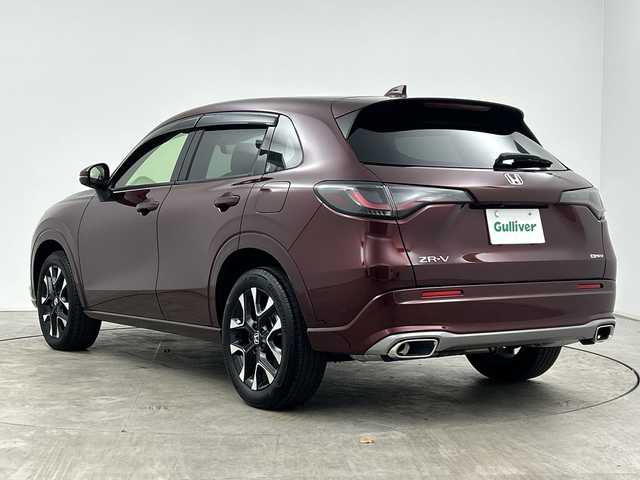 ホンダ ＺＲ－Ｖ ハイブリッド e:HEV Z 三重県 2023(令5)年 1.4万km ワイン /禁煙車//純正9型ナビ//BOSEプレミアムサウンド//全方位カメラ//レーダークルーズコントロール//純正ビルトインETC2.0//ホンダセンシング//衝突軽減ブレーキ//レーンキープアシスト//ブラインドスポットインフォメーション//ワイヤレス充電//前席シートヒーター//前席パワーシート（運転席メモリ付き）//本革シート//純正前後ドライブレコーダー//電動リアゲート//パドルシフト//MTモード付きAT