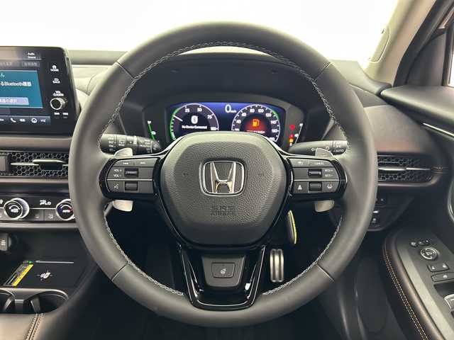 ホンダ ＺＲ－Ｖ ハイブリッド e:HEV Z 三重県 2023(令5)年 1.4万km ワイン /禁煙車//純正9型ナビ//BOSEプレミアムサウンド//全方位カメラ//レーダークルーズコントロール//純正ビルトインETC2.0//ホンダセンシング//衝突軽減ブレーキ//レーンキープアシスト//ブラインドスポットインフォメーション//ワイヤレス充電//前席シートヒーター//前席パワーシート（運転席メモリ付き）//本革シート//純正前後ドライブレコーダー//電動リアゲート//パドルシフト//MTモード付きAT