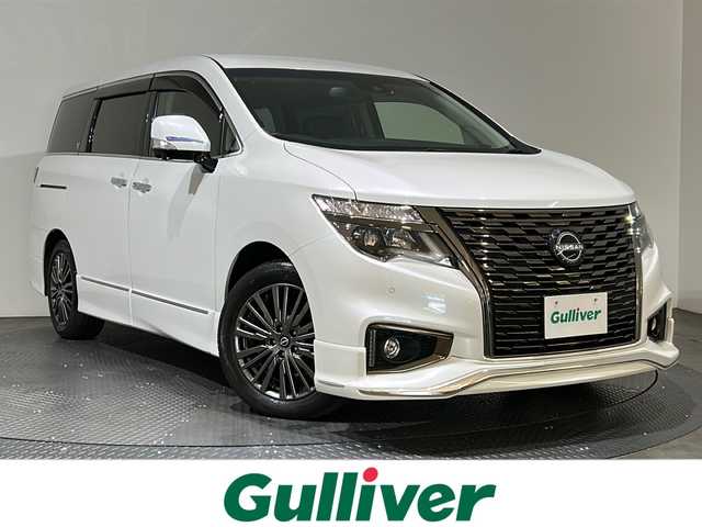 日産 エルグランド 250HWS S アーバンクロム 愛媛県 2023(令5)年 1.5万km ピュアホワイトパール ・エマージェンシーブレーキ /・純正10インチナビゲーション/・Bluetooth/フルセグテレビ/DVD/・アラウンドビューモニター/・両側パワースライドドア/・パワーバックドア/・ドライブレコーダー/・ETC/・スマートキー/・LEDヘッドライト/・オットマンセカンドシート/・クルーズコントロール