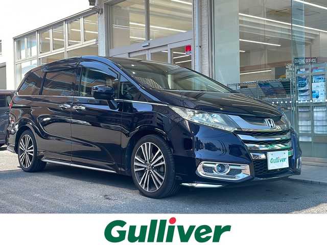 ホンダ オデッセイ アブソルート EX 高知県 2015(平27)年 8.2万km プレミアムヴィーナスブラックP 純正ナビ/(Bluetooth/CD/SD/DVD/USB/フルセグ)/レーダークルーズコントロール/ビルトインETC/バックカメラ/フリップダウンモニター/両側パワースライドドア/レーンキープアシスト/純正18インチアルミホイール/ハーフレザーシート/パワーシート/オートライト/LEDヘッドライト/フォグランプ/プッシュスタート/スマートキー/純正フロアマット/ドアバイザー/アイドリングストップ/パドルシフト/リアロールサンシェード/横滑り防止装置/衝突被害軽減ブレーキ