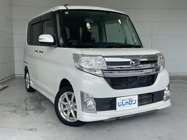 ダイハツ タント カスタム X スマートセレ SA 沖縄県 2014(平26)年 6.4万km パールホワイトⅢ (株)IDOMが運営する【じしゃロンコザ店】の自社ローン専用車両になりますこちらは現金またはオートローンご利用時の価格です。自社ローンご希望の方は別途その旨お申付け下さい/ＣＤ再生　/片側パワースライドドア　/プッシュスタート　/スマートキー　/アイドリングストップ　/純正アルミホイール　/純正フロアマット　/オートライト　/パワーウィンドウ　/パワーステアリング