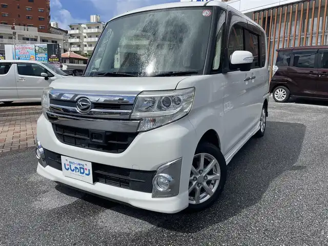 ダイハツ タント カスタム X スマートセレ SA 沖縄県 2014(平26)年 6.4万km パールホワイトⅢ (株)IDOMが運営する【じしゃロンコザ店】の自社ローン専用車両になりますこちらは現金またはオートローンご利用時の価格です。自社ローンご希望の方は別途その旨お申付け下さい/ＣＤ再生　/片側パワースライドドア　/プッシュスタート　/スマートキー　/アイドリングストップ　/純正アルミホイール　/純正フロアマット　/オートライト　/パワーウィンドウ　/パワーステアリング