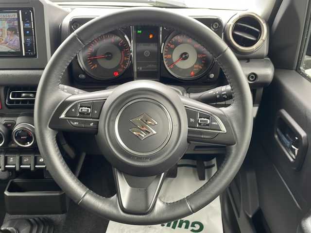 スズキ ジムニー XC 静岡県 2022(令4)年 2.4万km キネティックイエロー/ブラック メモリナビ/フルセグテレビ/バックカメラ/アイドリングストップ/クルーズコントロール/プッシュスタート/ETC/オートライト/コーナーセンサー/横滑り防止装置/レーンキープアシスト/カーテンエアバッグ/衝突被害軽減システム/LEDヘッドライト/スペアキー