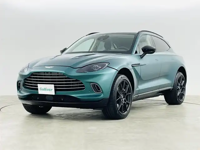 アストンマーティン Ａ・マーチン ＤＢＸ 707 福島県 2022(令4)年 0.2万km 緑 アクティブブレーキアシストシステム/・コーナーセンサー/・パーキングアシスト/パノラミックガラスルーフ/純正ワイドナビ/・BT/FM/AM/アップルカープレイ/バックカメラ/LEDヘッドライト/・フォグライト/シートヒーター/・エアーシート/純正アルミホイール付きサマータイヤ/ドラレコ/ハイエンドオーディオシステム/アイドリングストップ/プッシュスタート/・スマートキー