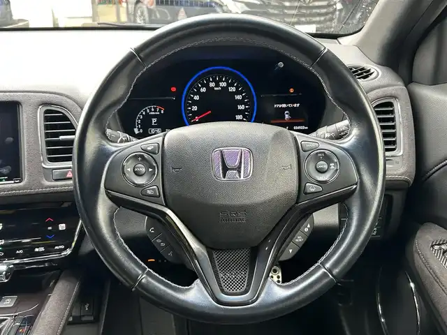 ホンダ ヴェゼル RS ホンダセンシング 福岡県 2019(令1)年 3.5万km クリスタルブラックパール 純正ナビ（VXM-197VFEi）/（ラジオ/CD/DVD/BT/フルセグTV）/アダプティブクルーズコントロール/バックカメラ/パドルシフト/前席シートヒーター/ドライブレコーダー/ビルトインETC/USB入力端子/純正18インチアルミホイール/純正フロアマット/レーンキープアシスト/横滑り防止装置/衝突被害軽減システム/オートライト/ステアリングスイッチ/アイドリングストップ/ドアバイザー/スペアキー/取扱説明書/保証書