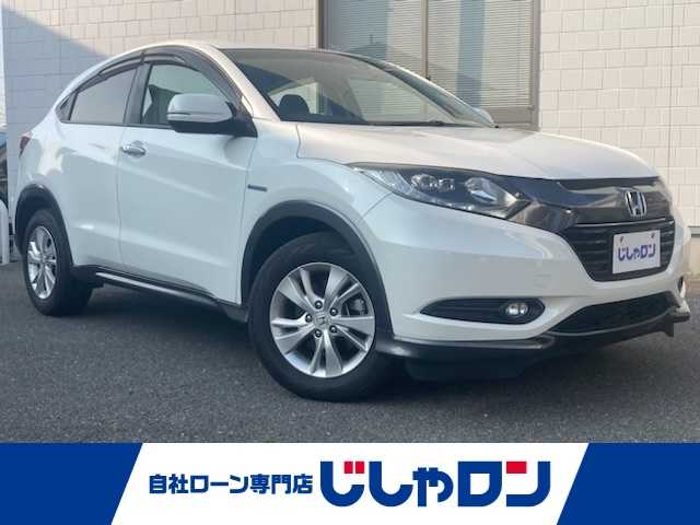 ホンダ ヴェゼル ハイブリッド X 三重県 2014(平26)年 9.5万km ホワイトオーキッドパール (株)IDOMが運営する【じしゃロン四日市店】の自社ローン専用車両になります。こちらは現金またはオートローンご利用時の価格です。自社ローンご希望の方は別途その旨お申付け下さい/社外SDナビ/フルセグTV/（CD/DVD/AM/FM/SD/USB/BT）/クルーズコントロール/バックカメラ/ETC/パドルシフト/ステアリングスイッチ/CTBA/電子パーキング/オートブレーキホールド/電動格納ウィンカーミラー