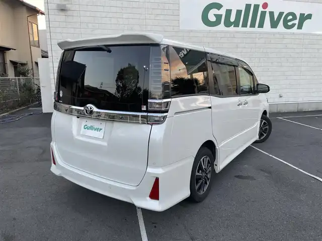 トヨタ ヴォクシー ZS 煌Ⅲ 静岡県 2021(令3)年 3.9万km ホワイトパールクリスタルシャイン 純正9インチナビ/フルセグTV/Bluetooth接続/バックカメラ/トヨタセーフティセンス/プリクラッシュセーフティ/レーンキープアシスト/横滑り防止装置/両側パワースライドドア/クルーズコントロール/ビルトインETC/プッシュスタート/スマートキー/ハーフレザーシート/LEDオートライト/オートハイビーム/フロアマット/取扱説明書