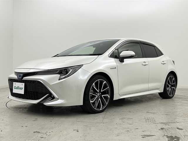トヨタ カローラ スポーツ ハイブリッドG Z 宮城県 2019(令1)年 5.3万km ホワイトパールクリスタルシャイン 禁煙車/ワンオーナー/トヨタセーフティーセンス/・レーダークルーズコントロール/・プリクラッシュセーフティーシステム/・レーントレーシングアシスト/・オートマチックハイビーム/・リアクロストラフィックアラート/・パーキングサポートブレーキ/・ロードサインアシスト/ブラインドスポットモニター/純正9インチナビ/（BT.CD.DVD.AM.FM.USB）/フルセグテレビ/バックカメラ/社外ドライブレコーダー（F）/ビルトインETC/電動パーキングブレーキ/AUTOHOLD/前席シートヒーター/革巻きステアリング/ステアリングスイッチ/プッシュスタート/スマートキー/スペアキー/純正フロアマット/純正ドアバイザー/純正18インチアルミホイール/LEDヘッドライト/LEDフォグランプ/アイドリングストップ/横滑り防止機能