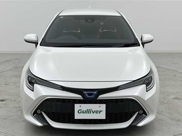 トヨタ カローラ スポーツ ハイブリッドG Z 宮城県 2019(令1)年 5.3万km ホワイトパールクリスタルシャイン 禁煙車/ワンオーナー/トヨタセーフティーセンス/・レーダークルーズコントロール/・プリクラッシュセーフティーシステム/・レーントレーシングアシスト/・オートマチックハイビーム/・リアクロストラフィックアラート/・パーキングサポートブレーキ/・ロードサインアシスト/ブラインドスポットモニター/純正9インチナビ/（BT.CD.DVD.AM.FM.USB）/フルセグテレビ/バックカメラ/社外ドライブレコーダー（F）/ビルトインETC/電動パーキングブレーキ/AUTOHOLD/前席シートヒーター/革巻きステアリング/ステアリングスイッチ/プッシュスタート/スマートキー/スペアキー/純正フロアマット/純正ドアバイザー/純正18インチアルミホイール/LEDヘッドライト/LEDフォグランプ/アイドリングストップ/横滑り防止機能